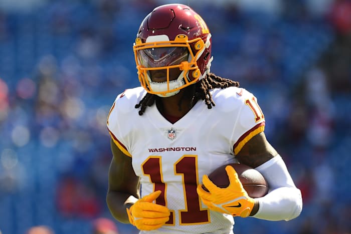 Washington Commanders WR Cam Sims warms up before game